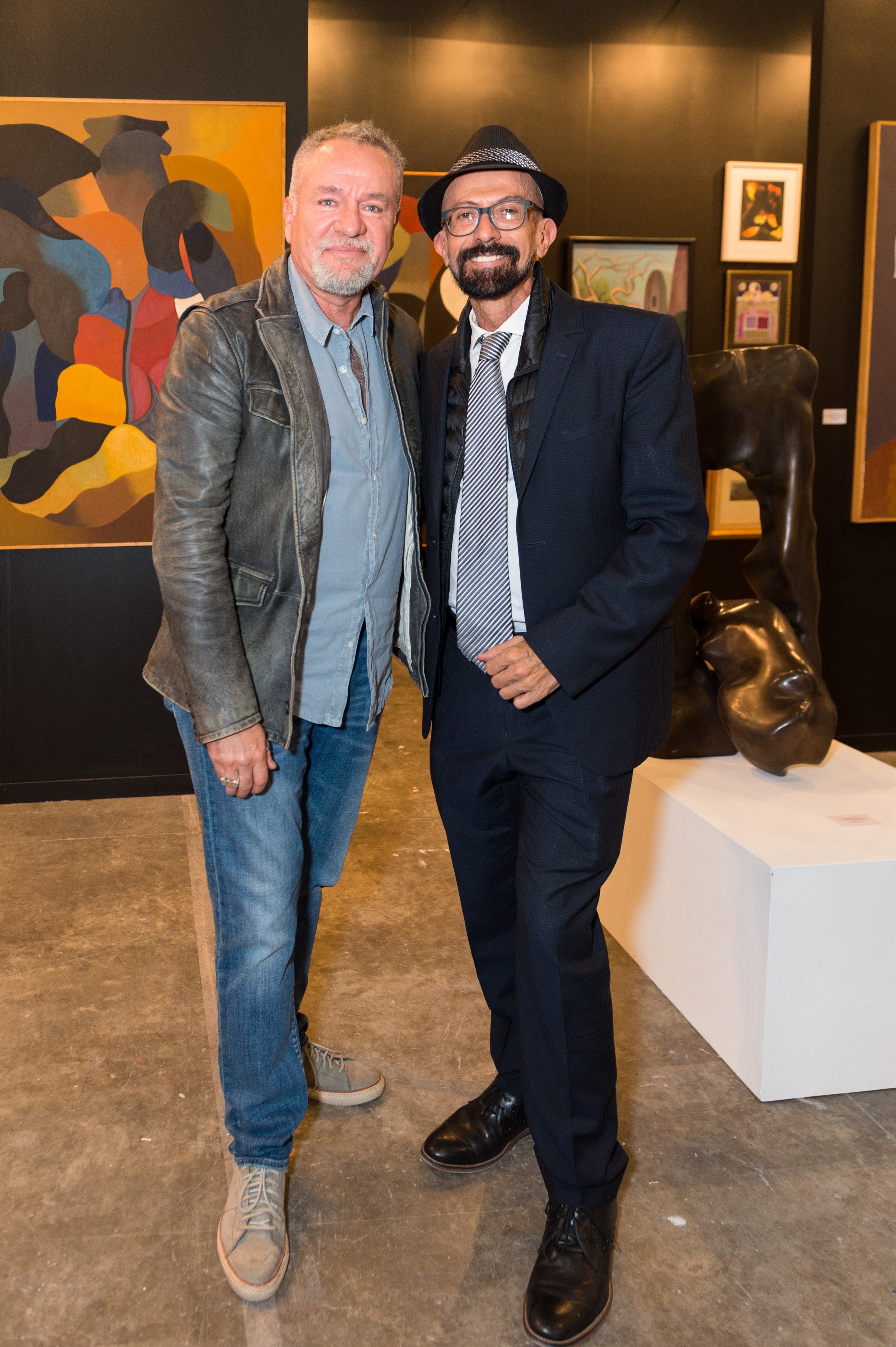 Alberto Castro y el galerista Oscar Román